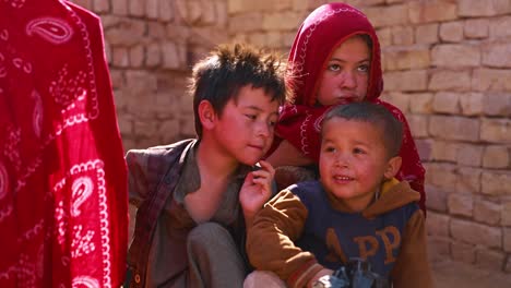 Poor-Afghan-children,-a-young-boy-and-girl-appear-saddened,-Orphan-in-need