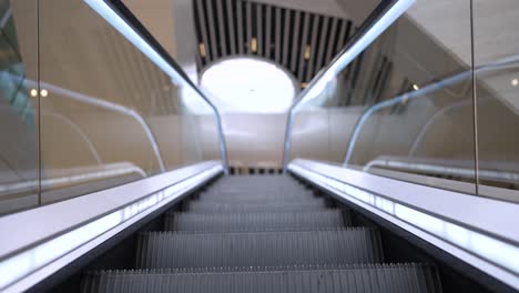 Escalator-going-up-inside-stadium-at-Parc-des-Princes-home-of-Paris-Saint-Germain-Football-team,-Wide-view