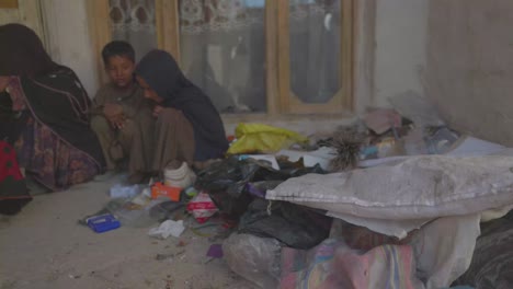 A-poor-Afghan-family-with-children-and-a-newborn-and-widow,-living-in-a-bad-situation-and-looking-for-assistance,-Oprhan-in-need-with-family