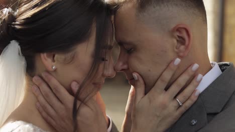 Portrait-of-lovely-newlyweds-caucasian-bride-embracing-groom,-wedding-couple-family-hugging