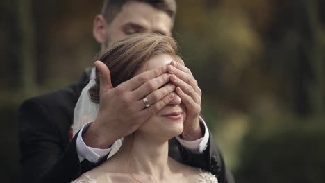 Newlyweds.-Caucasian-groom-with-bride-in-the-park.-Wedding-couple.-Happy-family