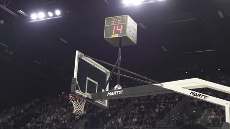 Slow-motion-shot-of-a-game-timer-and-shot-clock-counting-down-in-a-game