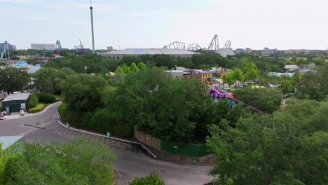 Aerial-establishing-shot-of-Seaworld-Sign-in-Orlando-during-sunny-day