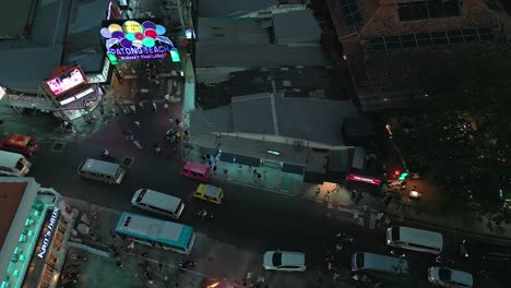 Top-view-of-traffic-at-Bangla-road-in-Patong-beach-during-nighttime-with-visitors-and-tourists-exploring-in-Phuket,-Thailand