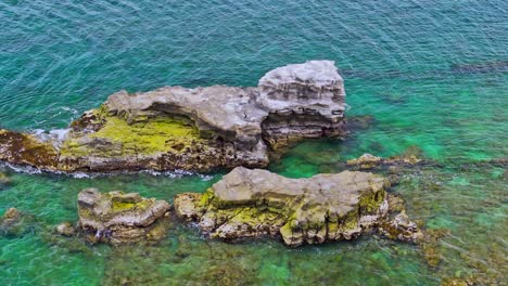 Aerial-View-Of-Rock-In-Sea-Japan