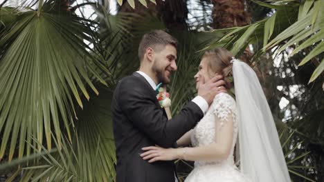 Newlyweds.-Caucasian-groom-with-bride-in-the-park.-Wedding-couple.-Happy-family