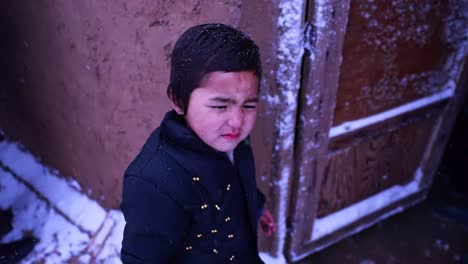 An-Afghan-boy-in-need,-looking-sad-at-the-camera,-Orphan-in-need