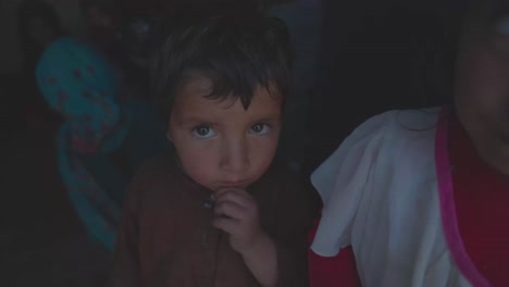 Poor-Afghan-children,-a-young-boy-and-girl-appear-saddened,-Orphan-in-need