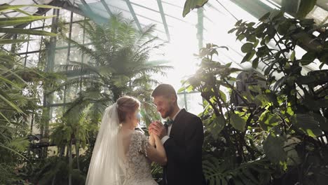 Newlyweds.-Caucasian-groom-with-bride-in-the-park.-Wedding-couple.-Happy-family