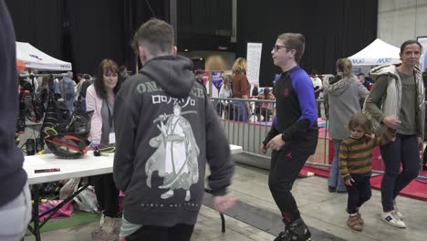 Slow-motion-shot-of-children-jumping-with-Kangoo-jump-shoes-at-a-sports-event