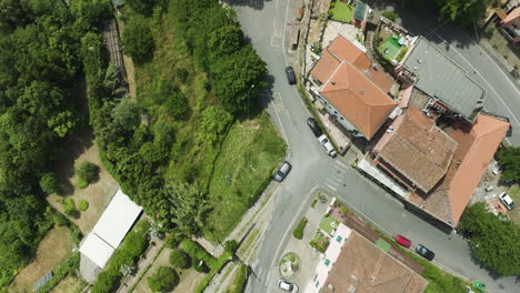 Foce-la-spezia-in-italy-showing-streets,-houses,-and-greenery-during-the-day,-aerial-view