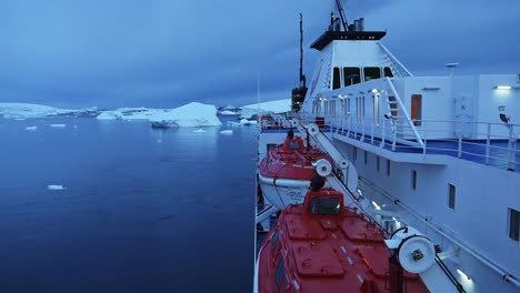 Antarctica-Ship-in-Beautiful-Scenery,-Cruise-Ship-Boat-in-Dramatic-Amazing-Antarctic-Peninsula-Scenery-and-Winter-Landscape-on-Tourist-Travel-Vacation-and-Holiday-to-Antarctica