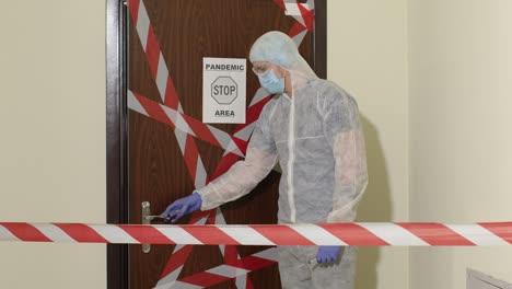 Medical-worker-visiting-family-of-mother-and-daughter-at-home-during-coronavirus-quarantine-lockdown