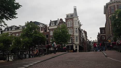 A-View-Of-Keizersgracht-At-The-Corner-Of-The-Herenstraat-In-Amsterdam,-Netherlands,-Europe