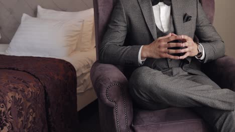 Man-put-on-wrist-watch,-groom-dresses,-male-businessman-waiting-for-meeting,-hand-with-clock