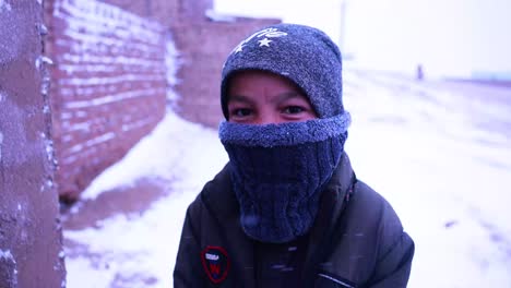 An-Afghan-boy-in-need,-looking-sad-at-the-camera,-Orphan-in-need