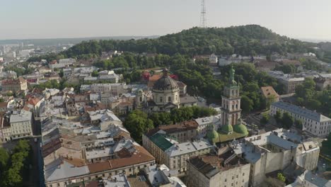 Aerial-Drone-Video-of-European-City-Lviv,-Ukraine,-Rynok-Square,-Central-Town-Hall,-Dominican-Church