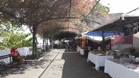 Bustling-market-street-with-colorful-stalls-in-Casco-Viejo,-Panama-City