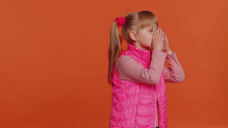 Toddler-girl-smiling-friendly-at-camera-and-waving-hands-gesturing-hello-or-goodbye,-welcoming