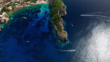 Top-down-aerial-drone-view-of-the-picturesque-rocky-coastline-of-Paleokastritsa-bay-in-Corfu,-Greece