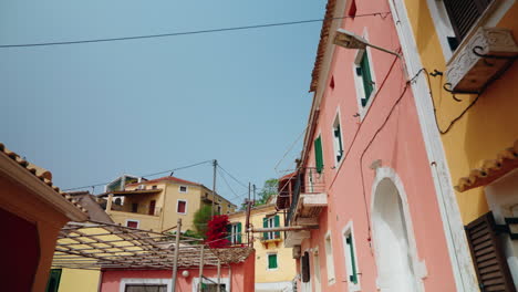 Walking-through-the-narrow-streets-of-Lakones-mountain-village-in-Corfu,-Greece