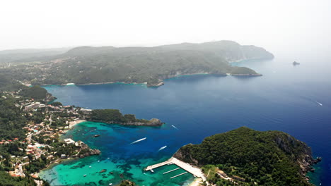 Aerial-drone-shot-over-the-picturesque-rocky-coastline-of-Paleokastritsa-bay-in-Corfu,-Greece