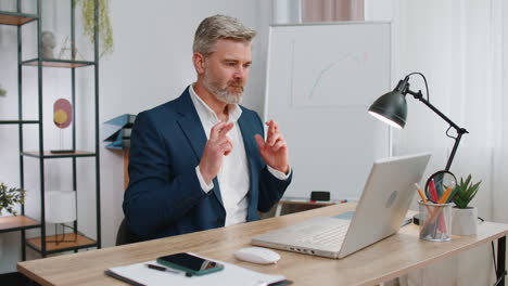 Business-man-winner-working-browsing-typing-on-laptop-at-office-celebrate-big-lottery-win-good-news