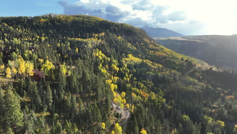 Bright-Yellow-and-Green-Forest-Valley-in-Telluride,-Colorado,-Aerial-View