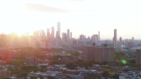 Aerial-view-of-the-sunset-behind-the-New-York-City-skyline