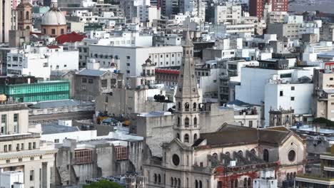 Drone-Shot-of-Downtown-Montevideo,-Uruguay,-Buildings-and-St