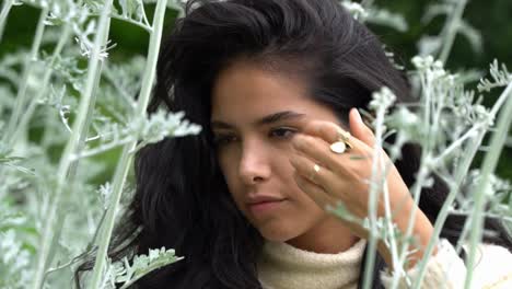 Attractive-Latina-model-posing-in-jungle,-close-up-portrait-view