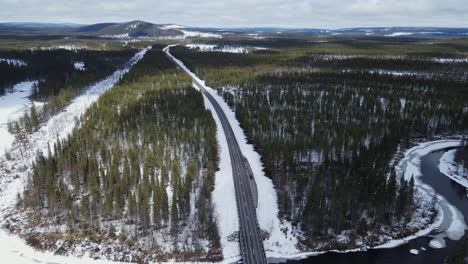 Lapland-Road-Through-Snowy-Forest-In-Winter-Near-Kiruna-In-Norrbotten,-Sweden