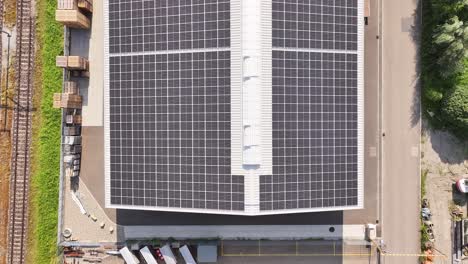 Top-view-of-building-with-solar-panels-on-the-roof-in-Weesen,-Glarus,-Switzerland