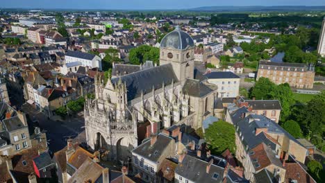 Bird's-eye-aerial-view-about-the-Basilica-of-Notre-Dame-d'Alencon,-Alencon,-France