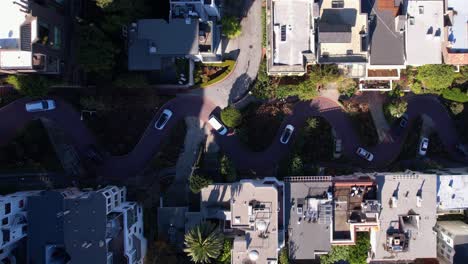 Top-Down-Aerial-View,-Lombard-Street-and-Cars-Moving-on-Curvy-Road,-San-Francisco,-California-USA-on-Sunny-Day