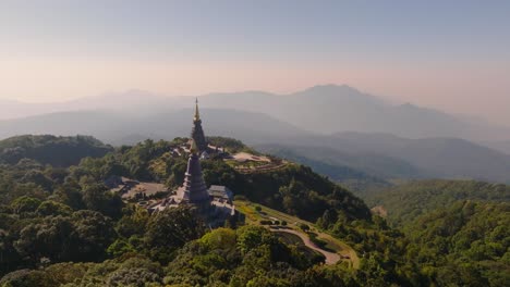 4K-aerial-drone-footage-of-pagodas-in-Doi-Inthanon,-Chiang-Mai,-Thailand,-Asia