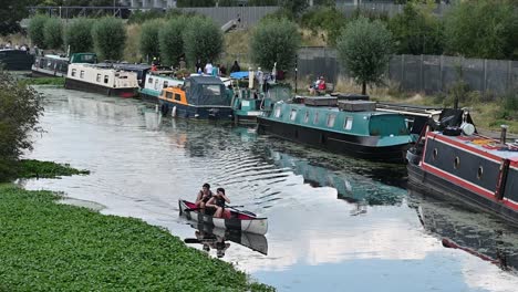 Rowing-along-the-River-Lee,-London,-United-Kingdom