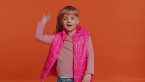 Young-little-school-children-girl-listening-music-smiling-dancing-disco-party-having-fun-celebrating