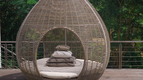 Rattan-Garden-Bed-At-Renaissance-Bali-Uluwatu-Resort-And-Spa-In-Uluwatu,-Bali,-Indonesia