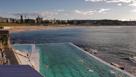 Wide-view-over-the-Bondi-Icebergs-pool-looking-towards-Bondi-Beach-at-sunrise