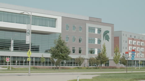 1855-building-on-the-campus-of-Michigan-State-University-in-East-Lansing,-Michigan-with-stable-wide-shot