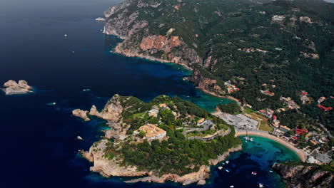 Aerial-drone-shot-over-the-picturesque-rocky-coastline-of-Paleokastritsa-bay-in-Corfu,-Greece