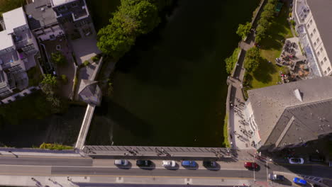 Aerial-top-down-view-tracking-the-River-Corrib's-course-through-busy-Galway-city