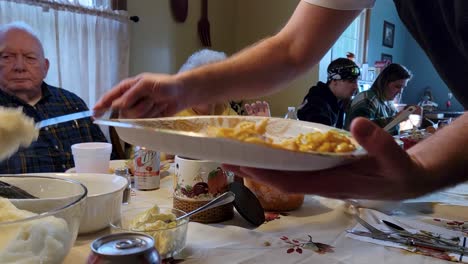 High-quality-footage-capturing-a-family-gathering-and-meal-time-around-the-dinner-table