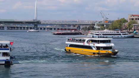 A-Bosphorus-Cruise-Tour-boat-floats-on-the-waters-in-Istanbul,-Turkey