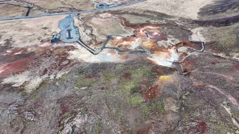 Aerial-footage-highlights-the-vibrant-colors-and-unique-geology-of-Geothermal-Area-Seltun-south-of-Reyjkavik,-making-it-a-fascinating-destination-for-nature-lovers-and-adventure-seekers