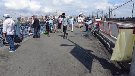 Capturing-people-and-visitors-on-the-Galata-Bridge-in-Istanbul,-Turkey