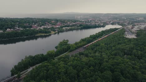 Railroad-Tracks-On-Magog-Rivershore-Near-Sherbrooke-Downtown-In-Quebec,-Canada