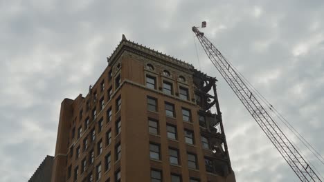 A-detailed-view-of-the-demolition-process-of-a-historic-high-rise-building-in-Youngstown,-Ohio