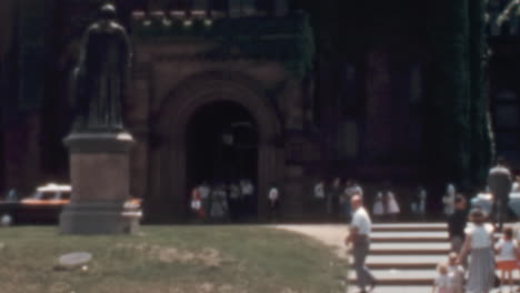 Pedestrians-and-Classic-Cars-at-the-Entrance-of-The-Smithsonian-Institution